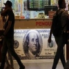 Санкции против банков изменили статус доллара в России